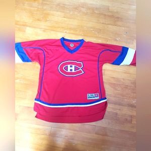 Montreal Canadiens official NHL jersey youth L/XL or mens xsm or woman sm